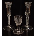 A pair of mid-18thC air twist stem glasses, the bowls etched with roses of Jacobean significance,