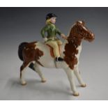 Beswick girl on skewbald pony, H15cm