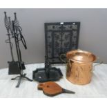 Art Nouveau copper covered coal scuttle, foot scraper, Arts & Crafts companion set and a fire guard