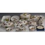 Approximately twenty five pieces of Royal Worcester oven and dinner ware decorated in the Evesham
