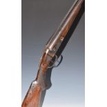 J Stevens Arms & Tool Co Model 685 12 bore side by side shotgun with named locks, chequered semi-