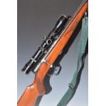 Voere .22 bolt-action rifle with chequered semi-pistol grip, magazine, sight mounts, sling, Nikko