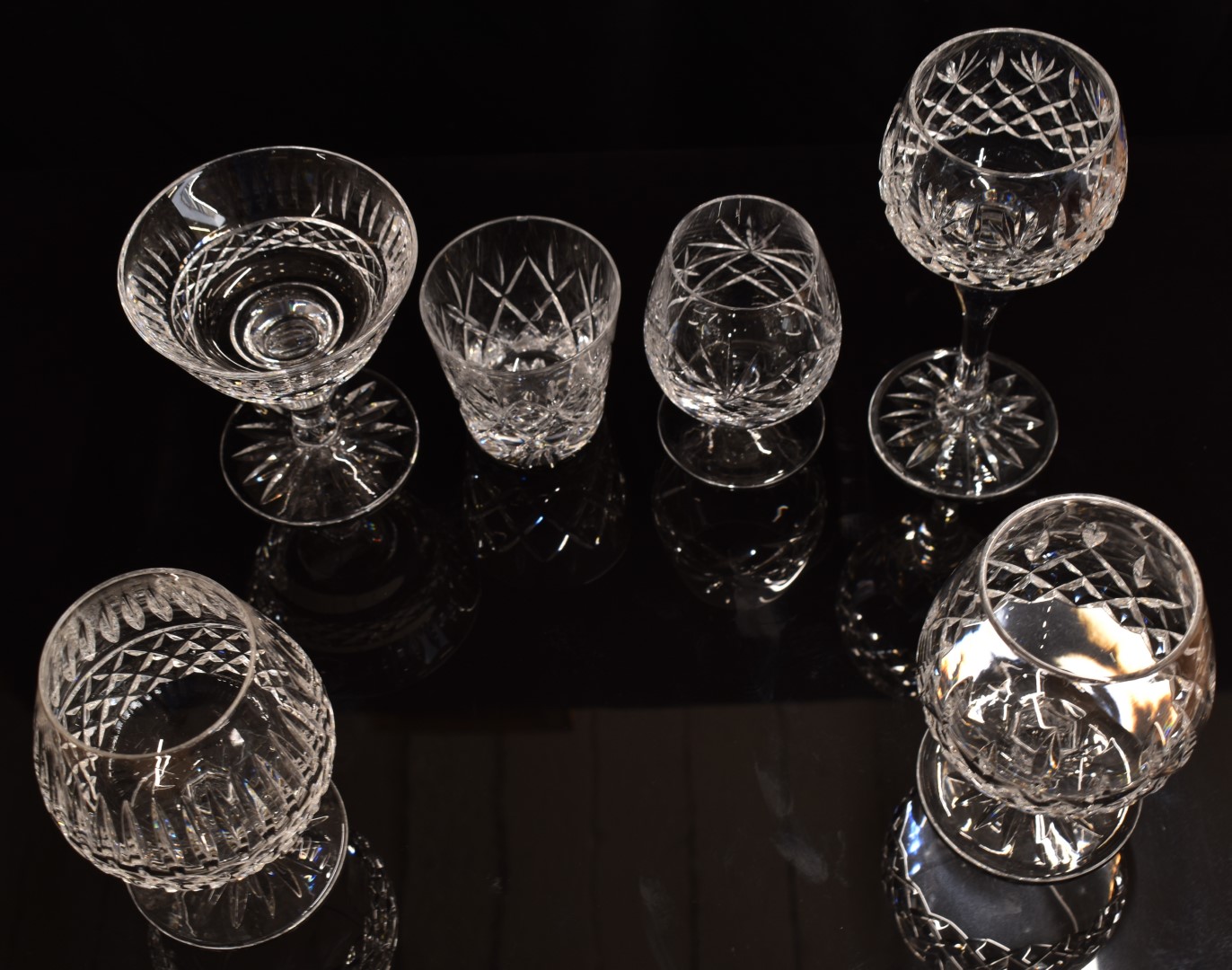 A collection of clear cut crystal drinking glasses including six Waterford brandy glasses, a set - Image 2 of 2