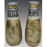 A pair of Royal Doulton pedestal bottle vases, H21cm