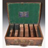 Henry Atkin brass and leather bound shotgun cartridge carry case with original label 'Henry Adkin