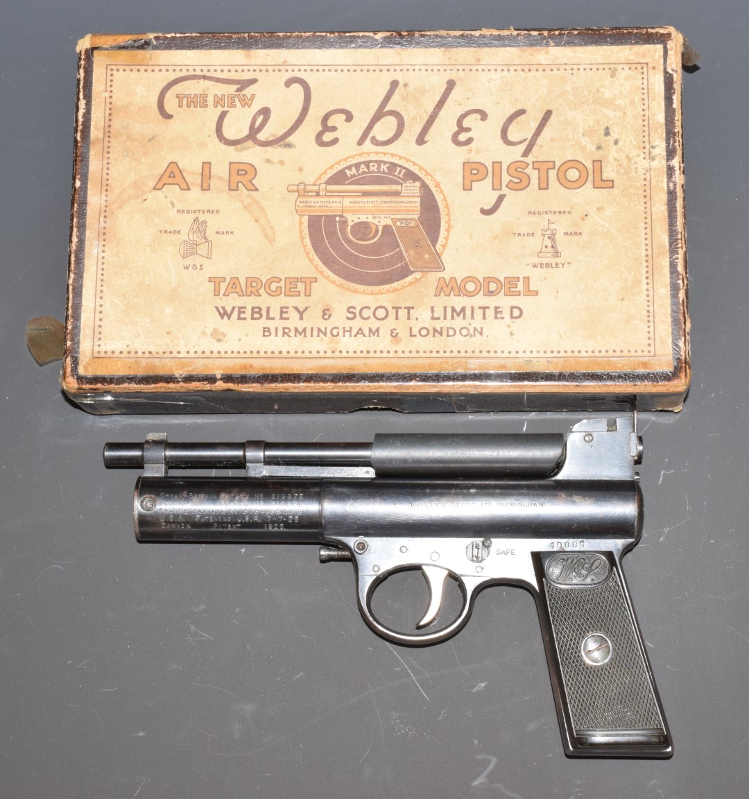 Webley Mark II .177 air pistol with monogrammed and chequered grips, in original box with