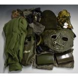 Modern military equipment including two webbing vests, entrenching tool, cleaning kits, ear