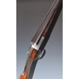 F P Baker & Co 12 bore side by side ejector shotgun with chequered grip and horn tipped forend,