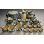 Approximately 107 pieces of Clarice Cliff Art Deco dinner, tea and coffee ware decorated in the Blue