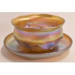 Louis Comfort Tiffany favrile glass bowl and plate in iridescent gold with notched decoration to the