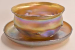 Louis Comfort Tiffany favrile glass bowl and plate in iridescent gold with notched decoration to the