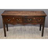 Early 19thC country oak sideboard with three drawers and shaped front stretcher, W137 x D46 x H79cm