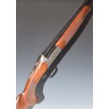 Fabarm Elos 12 bore over and under ejector shotgun with named and engraved locks and underside,