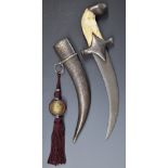 North African Jambiya dagger with Arabic script to the eight inch curved Damascus blade, bone grip