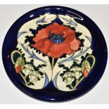 Moorcroft charger decorated in the Poppy pattern, D26cm