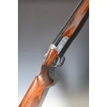 Fausti Pro Competition 12 bore over and under ejector shotgun with named and engraved locks and