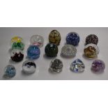 Fifteen glass paperweights including Caithness, Mdina, Alum Bay and Isle of Wight.