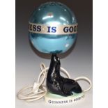 Carltonware 'Guinness is Good For You' figural sea lion convector lamp with revolving ball/shade,