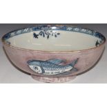 English Delft large pedestal bowl, London c 1750, the exterior decorated with three fish against a