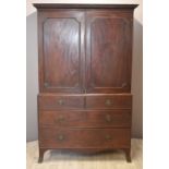 A 19thC mahogany linen press with three graduated drawers, W103 x D60 x H207cm