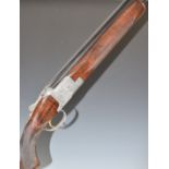 Browning B25 Diana 12 bore over and under ejector shotgun with engraved scenes of bird to the