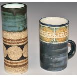 Troika sleeve vase and a mug with printed and signed marks to bases, tallest 15cm