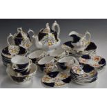 Forty two pieces of 19thC Gaudy Welsh tea ware, twelve place setting with extra pieces