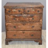 18th/19thC oak chest of two over three drawers with crossbanded and feathered decoration, raised