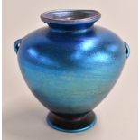 Louis Comfort Tiffany favrile glass vase in iridescent blue with loop handles, marked LCT Favrile to