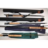 Four fly fishing rods including two Fulling Mill four piece 9ft #5, World Class FM-GX Gold Fly