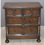Carolean style oak bachelor's chest of drawers raised on bun feet, W76 x D44 x H76