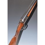 LIG 12 bore side by side shotgun with engraved locks, underside and fences, chequered grip and