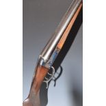 French 12 bore side by side action shotgun with scrolling trigger guard underlever, chequered semi-