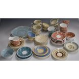 Approximately sixty eight pieces of Susie Cooper tea ware in various patterns including some