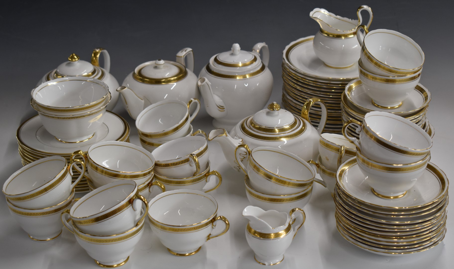 Approximately 92 pieces of tea ware with similar gilt decoration including Royal Worcester