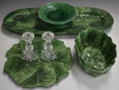 A collection of majolica ware including a large oval dish and a pair of Waterford candlesticks,