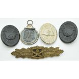 Five German WW2 Third Reich Nazi badges including Close Combat with F.E.C.W.E Peekhaus Berlin and