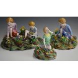 Three Crown Staffordshire figures of children picking flowers, largest W24 x H17cm