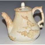 An 18th/19thC blanc de chine teapot with relief moulded decoration, H11cm
