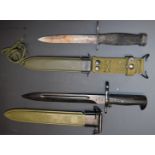 WW2 American M7 bayonet with 16.5cm blade and scabbard marked US M8A1, together with a copy of an M1