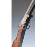 Foreign .410 single barrelled folding poacher's shotgun with chequered grip, side lever and 28