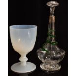 A c1900 decanter with applied glass snake, star cut base and silver collar, London marks rubbed,