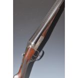 Thomas Wild 12 bore side by side shotgun with engraved scenes of birds to the named locks,