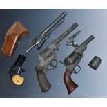 Four blank firing and replica revolvers and pistols including an Umarex 6mm Flobert Derringer with