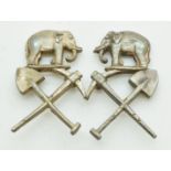 Two small collar badges, elephant over crossed pick and shovel, stamped Sterling