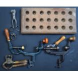 A collection of 12 bore shotgun re-loading and shooting accessories including cartridge extractor,