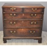 Georgian mahogany chest of two over three graduated drawers raised on bracket feet, W108 x D51 x