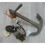 A  metal boat anchor together with two swing bridge padlocks and keys, one stamped Trade Mark.