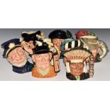 Ten large Royal Doulton character jugs including North American Indian, Golfer, Trapper and Tam O'