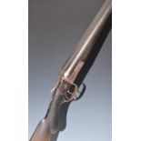 Belgian 12 bore side by side shotgun with shaped locks, chequered semi-pistol grip and forend,